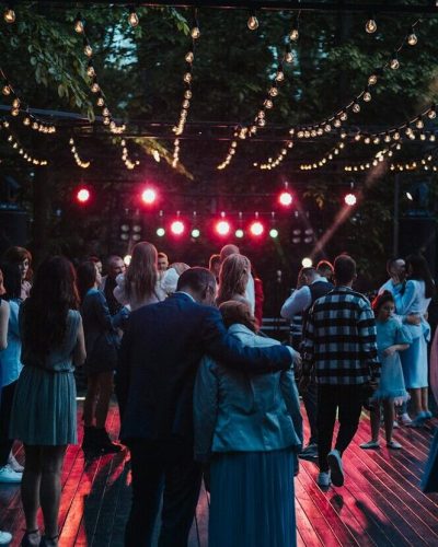 people walking on street during night time